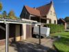 Freistehendes Einfamilienhaus mit Baugrundstück Hasenbüren - Ansicht Schuppen-Garage